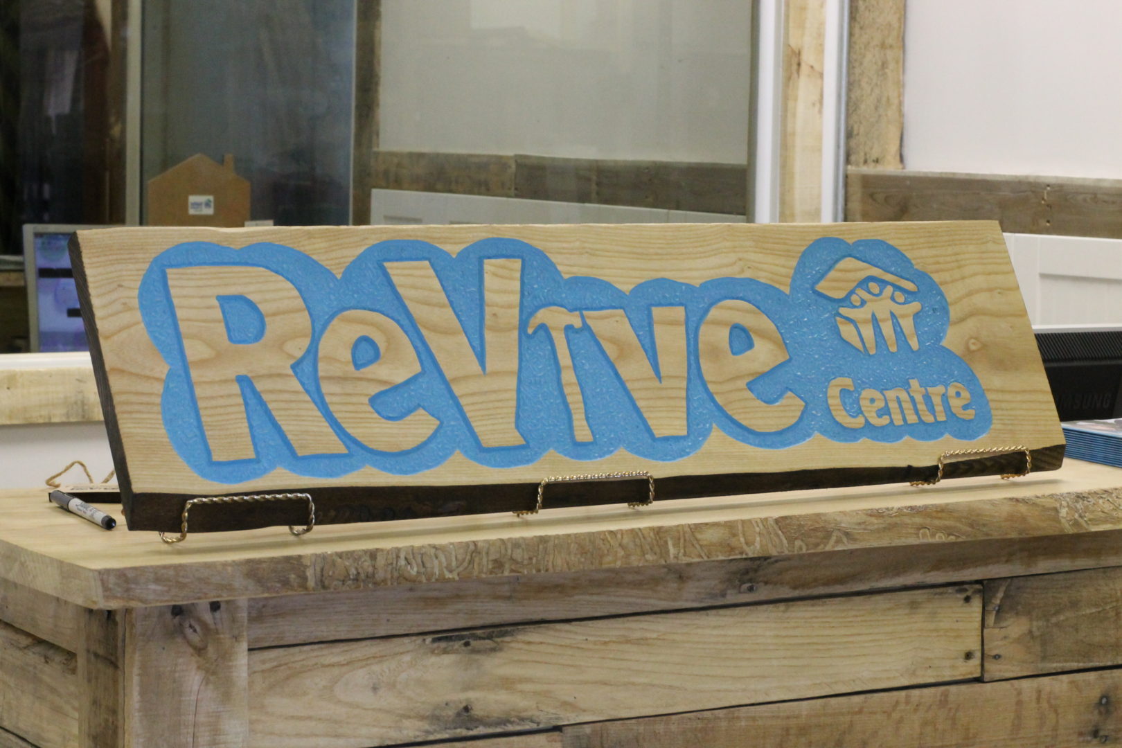 A sign reading, "ReVive Centre."
