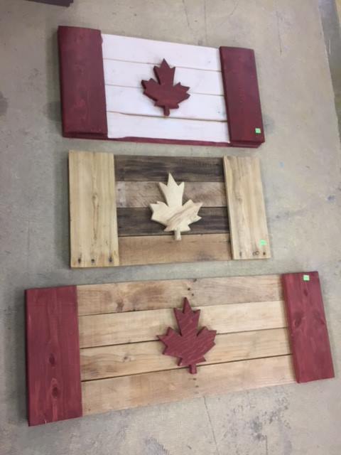 Canadian flags in 3 different colours, made in our ReVive Centre.