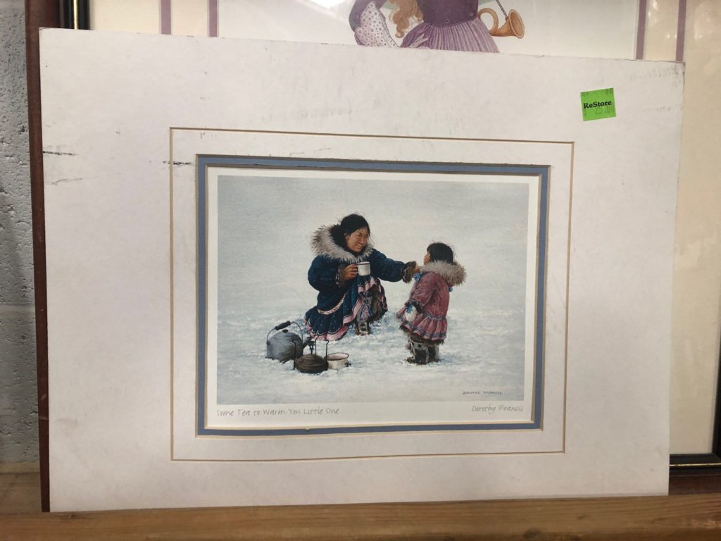 Painting of Inuit peoples, found in our Burlington ReStore.