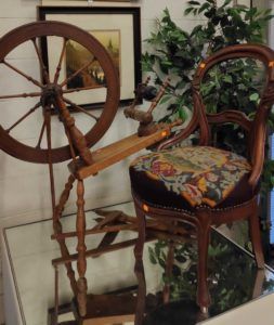 Vintage pieces, such as spinning wheel and some artwork in Orangeville ReStore