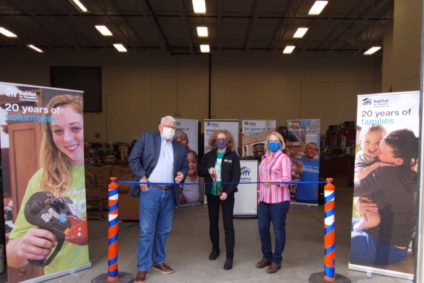 Orangeville Mayor Sandy Brown, Habitat HMD CEO Eden Grodzinski, and MPP Sylvia Brown cut the ribbon at the Orangeville ReStore relaunch last November 23rd, 2021.